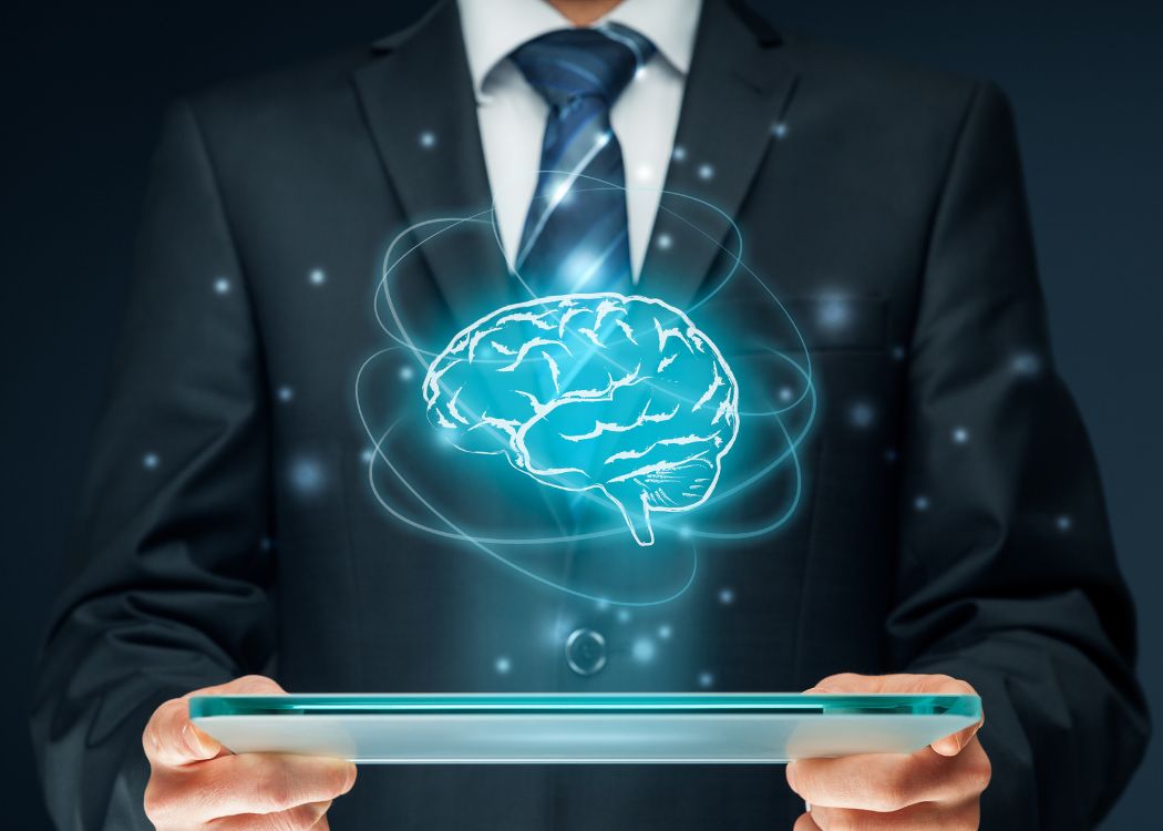 Homem com um computador com um cérebro acima representando a IA Generativa
